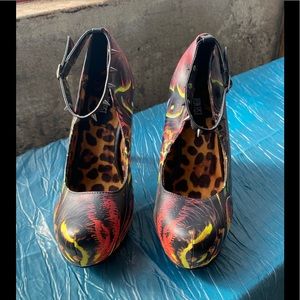 Iron Fist NWOT pumps with spike embellishments.